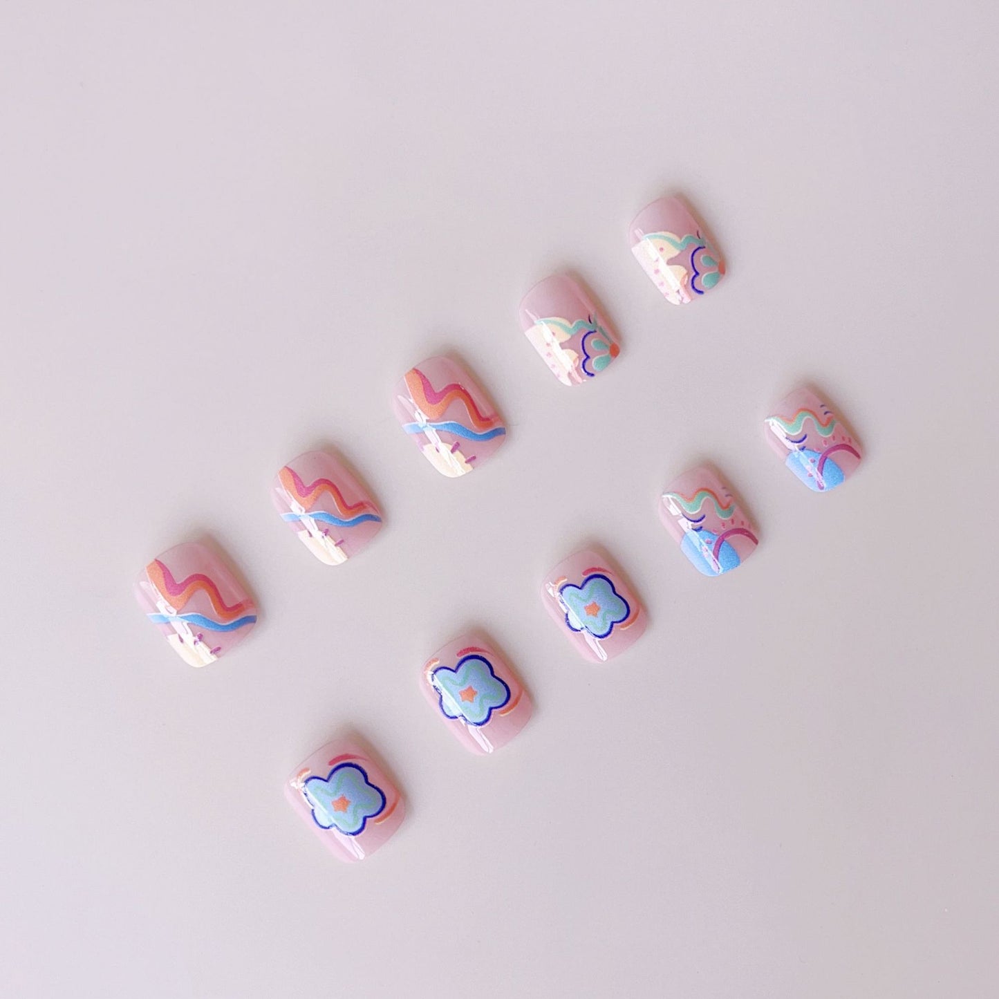 Kunstnagelset mit buntem zur Neonfarben inspirierten Design Brehn