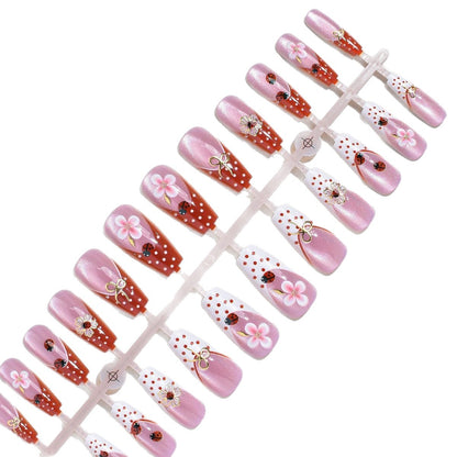 Künstlerische florale Press-On-Nageltips Brehn