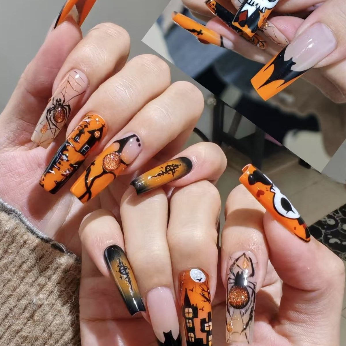 Kunstnagelset mit Halloween-Motiven und kreativem Glitzer Brehn