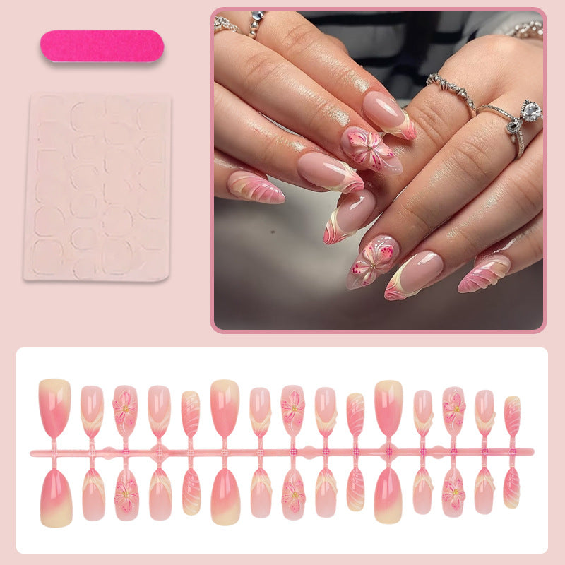 Kunstnagelset mit zarten Blumendesigns und modernen Ombre-Effekten Brehn