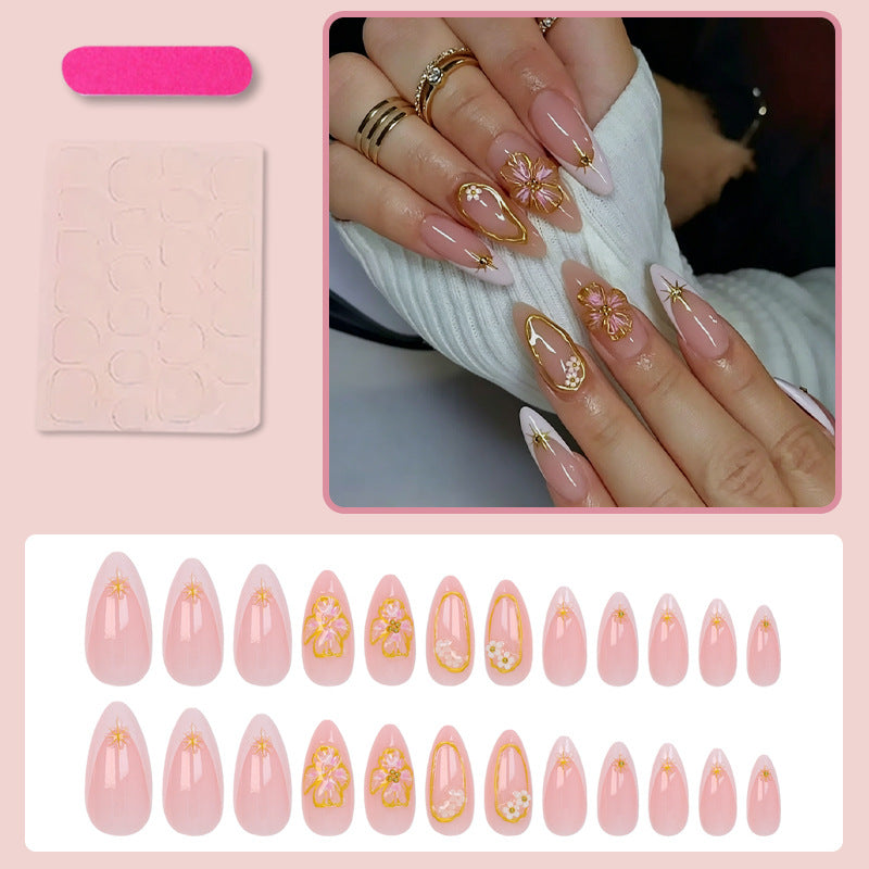 Kunstnagelset mit eleganten floralen und glamourösen Details Brehn