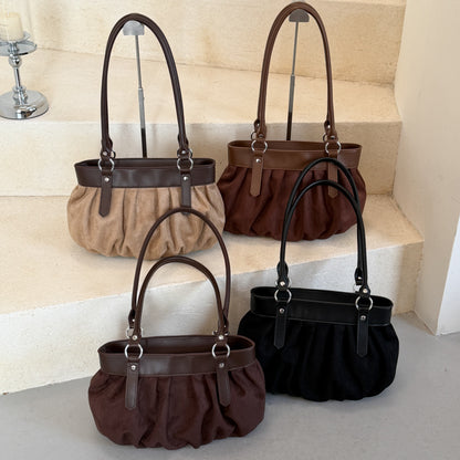 Geraffte Wildleder-Handtasche