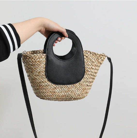 Damen Handtasche aus geflochtenem Material mit Lederdetails Brehn