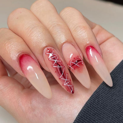Kunstvolle Nagelverlängerungen im eleganten Ombre-Stil mit Kunstmotiv Brehn