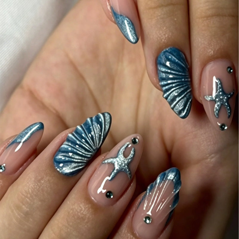 Kunstnagelset mit maritimen Muschel- und Sternmotiv Brehn
