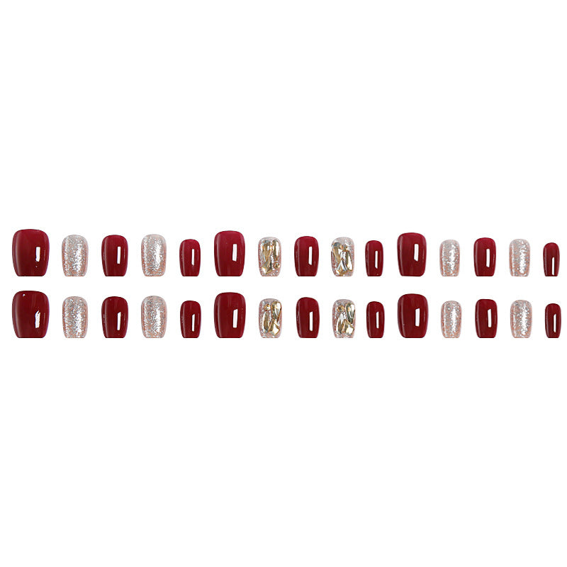 Kunstnagelset mit eleganten Glitzer- und Metallic-Akzenten Brehn