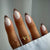 Dekoratives Press-On-Nagelset mit eleganten Leopardenakzenten Brehn