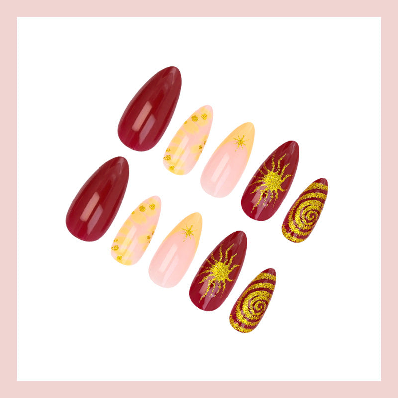 Kunstnagelset mit glamourösen Designs und kreativen Akzenten Brehn