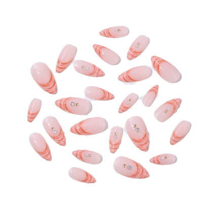 Kunstnagelset mit geschwungenem Spitzenstil und Glitzerakzenten Brehn