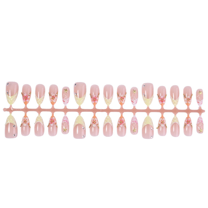 Beeindruckendes florales Design Press-On Nagelset Brehn