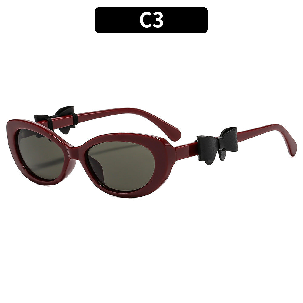 Vintage-inspirierte Katzenaugen-Sonnenbrille mit dekorativem Bogen