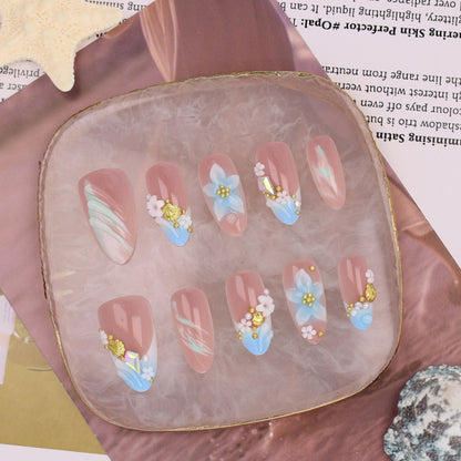 Kunstnagelset mit kunstvollen floralen Akzenten Brehn