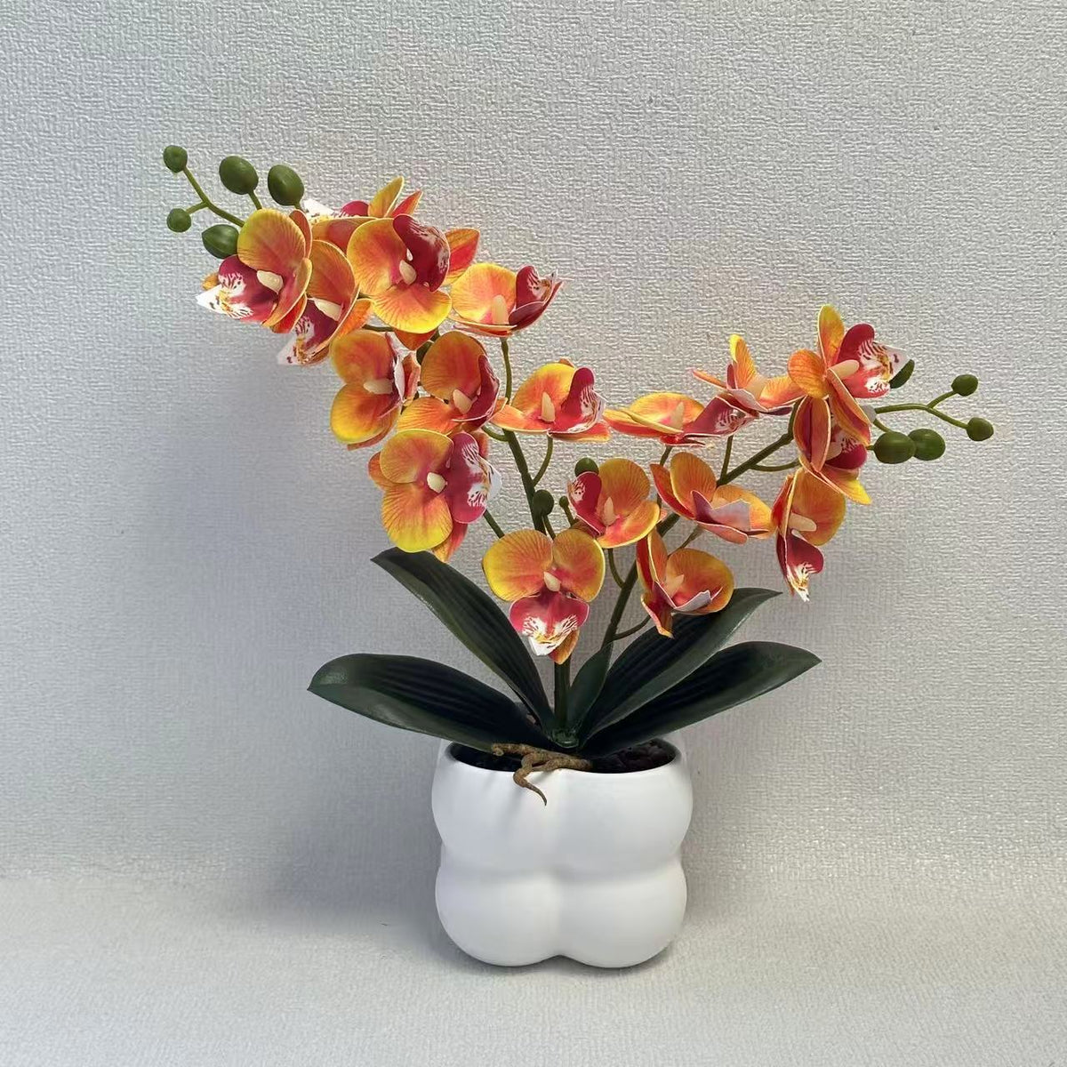 Lebensechte Orchideen Tischmittelstück
