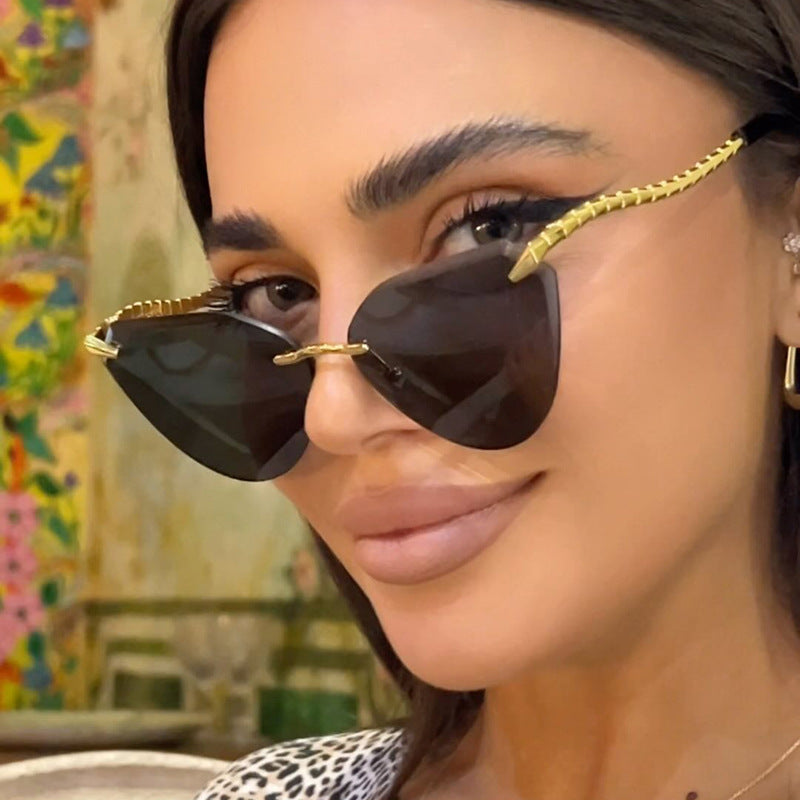 Damen Cat-Eye Sonnenbrille mit einzigartigem goldenen Rahmendesign und schützenden Gläsern Brehn