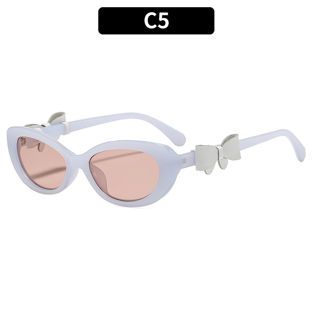 Vintage-inspirierte Katzenaugen-Sonnenbrille mit dekorativem Bogen