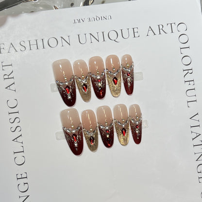 Dekoratives Stiletto Press-On Nagelset mit Edelsteinakzenten Brehn