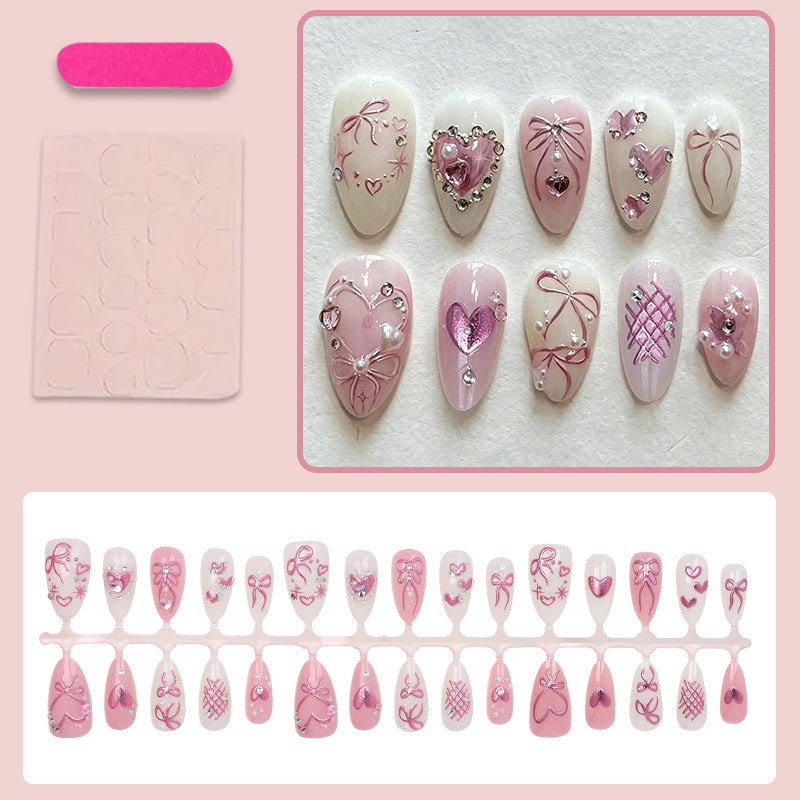 Kunstnagelset mit romantischen Schleifen- und Herzdesigns Brehn