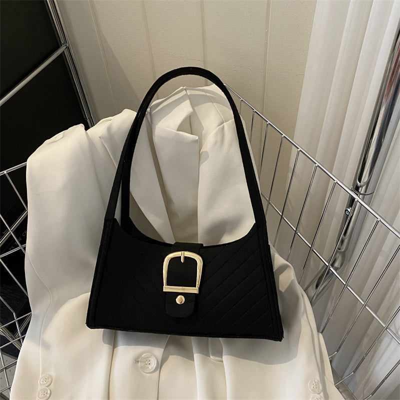 Strukturierte gesteppte Handtasche