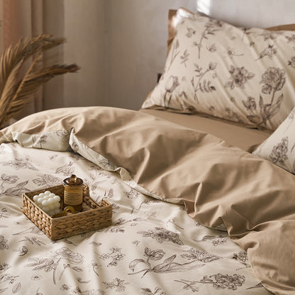 Wendbares Bettwäsche-Set aus Baumwollsatin mit botanischem Skizzenprint und glattem Rückseitenbezug