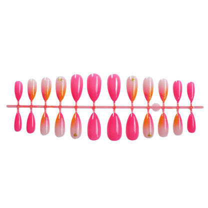 Press-On Nail Set mit lebhaftem Farbverlauf-Design und goldenen Akzenten Brehn