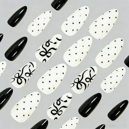Künstlerisches Press-On-Nagelset mit Schleifen-Designs Brehn