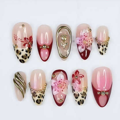 Kunstnagelset mit eleganten floralen und tierischen Akzenten Brehn