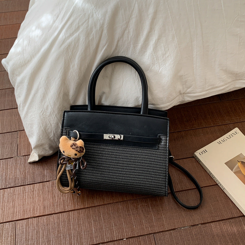 Elegante gewebte Handtasche mit abnehmbarem Schulterriemen