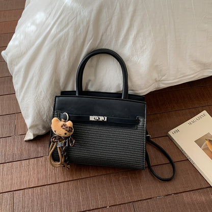Elegante gewebte Handtasche mit abnehmbarem Schulterriemen
