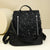 Sternmuster Multi-Taschen Rucksack Brehn