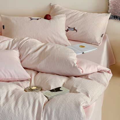 Wendbares strukturiertes Baumwoll-Satin-Bettbezug-Set mit dezenten gestickten Motiven und Kissenbezügen