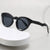 Damen modische Sonnenbrille mit feline Features Brehn