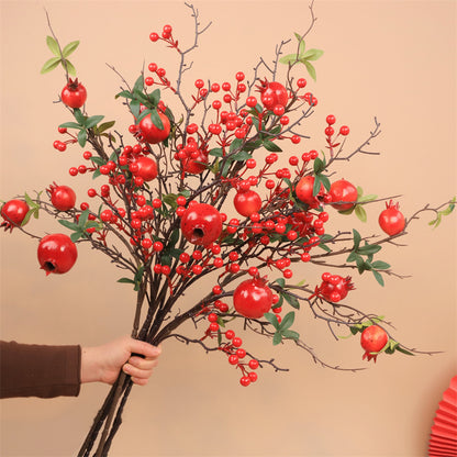 Dekorative Granatapfelblütenarrangement