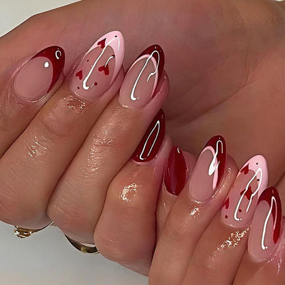 Kunstnagelset mit romantischen Herz-Designs und elegantem Glanz Brehn