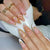 Elegante florale Gel-Nagelkunst Brehn