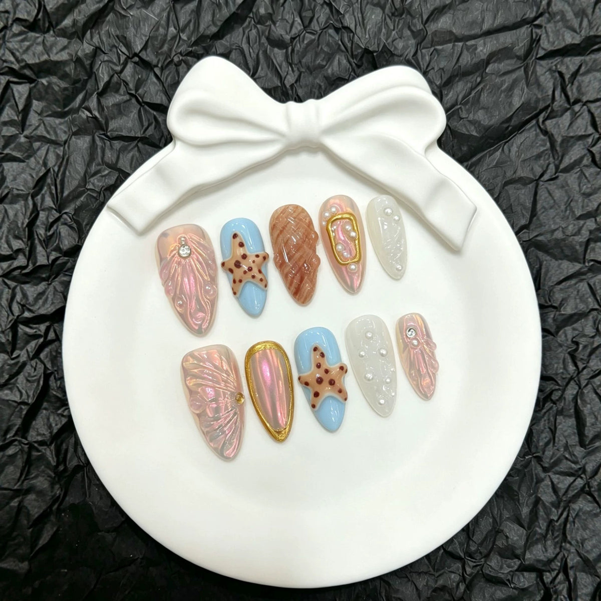 Dekorative Press-On Nagelkunst Set mit einzigartigen maritimen Designs