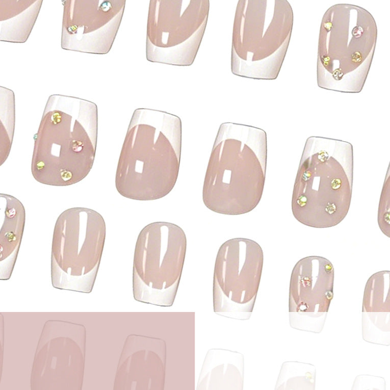 Elegante French Tip Nagelkunst-Verstärkungen mit Edelsteinakzenten Brehn