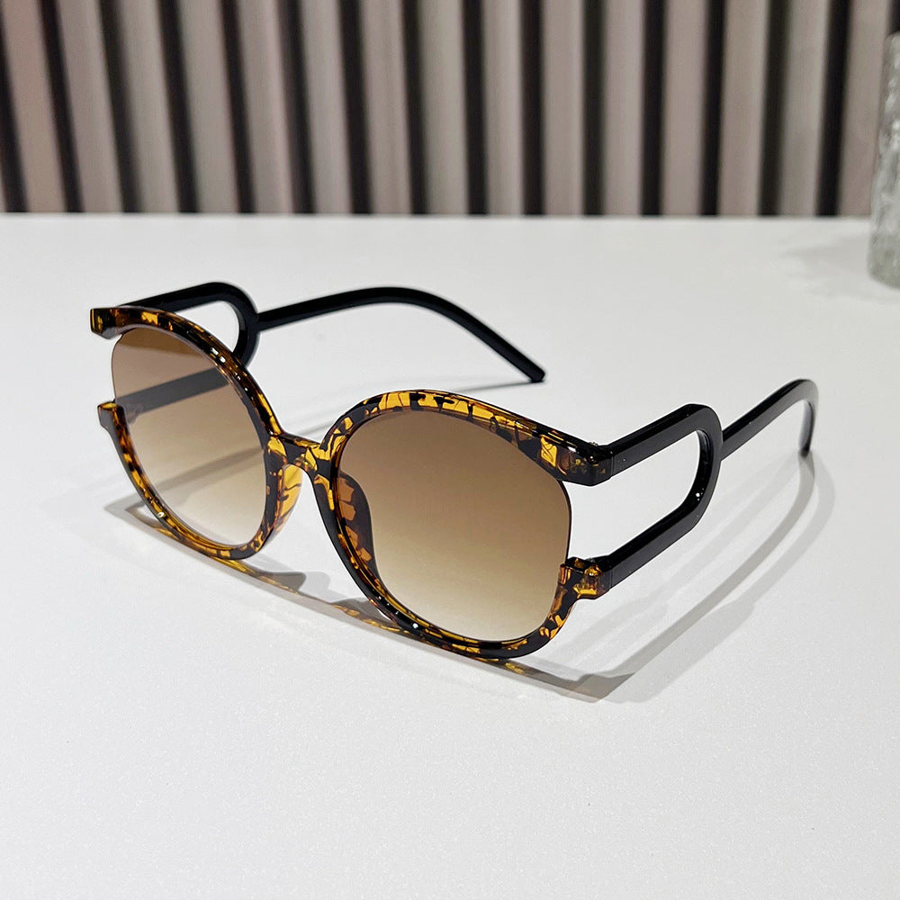 Avant-Garde Zirkuläre Rahmen Sonnenbrille Brehn