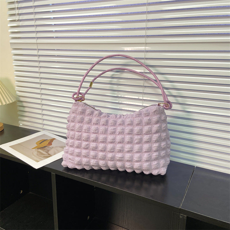 Texturierte handgefertigte Schultertasche