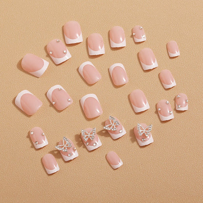 Kunstnägel mit eleganten Schmetterlingsverzierungen Brehn