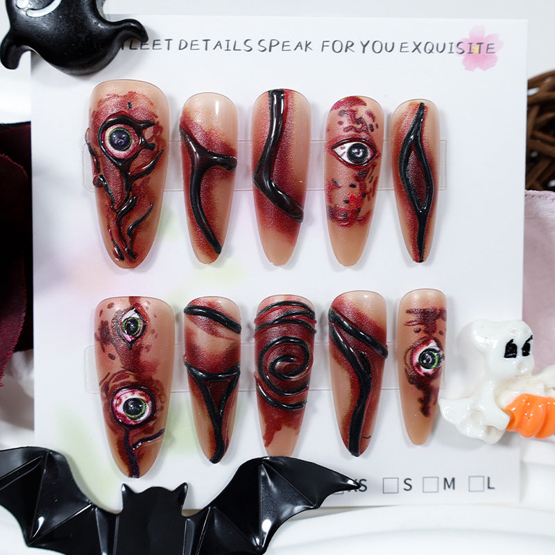 Kreatives Kunstnagelset mit gruseligem Design Brehn