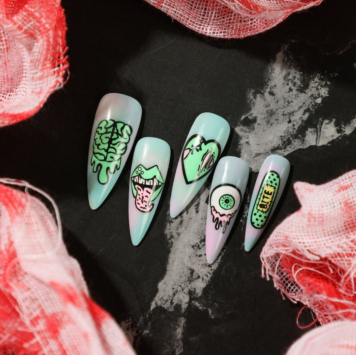 Kunstvolle Stiletto-Nägel mit kreativen Motiven und detailgetreuer Gestaltung Brehn