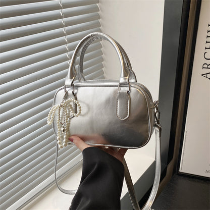 Elegante perlenverzierte Handtasche