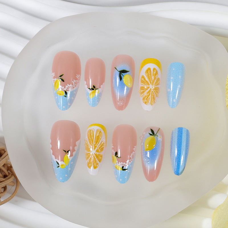 Kunstnagelset mit fröhlichen Zitrus- und Blumenmotiven Brehn