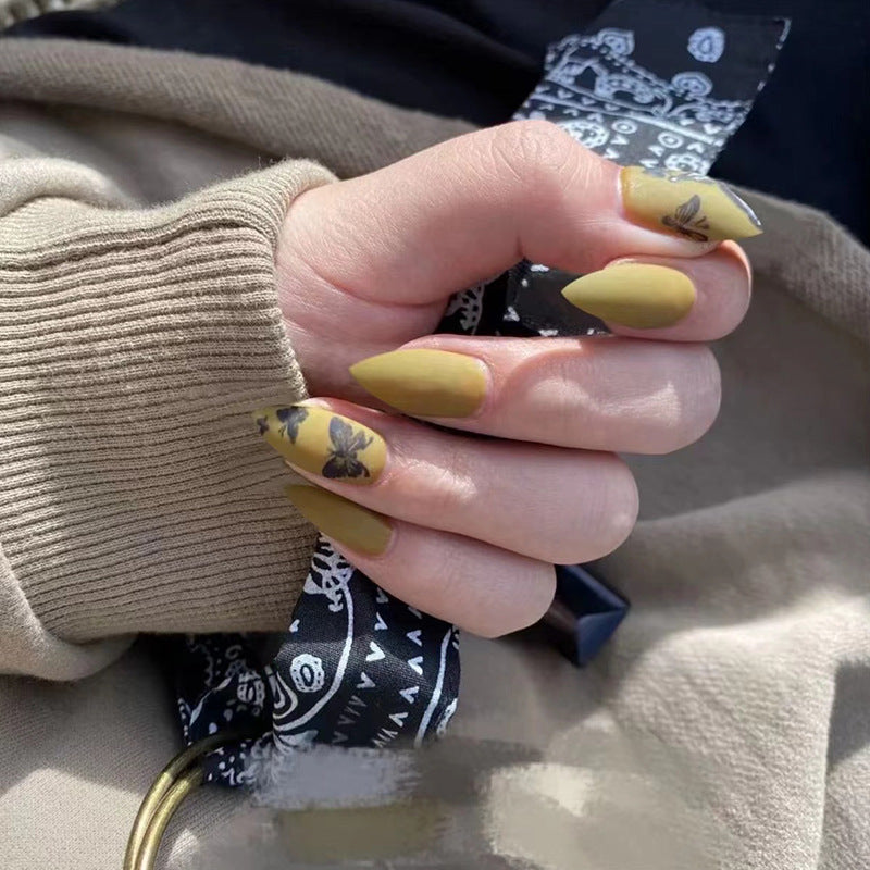 Künstlerisches Stiletto Press-On Nagelkunstset mit Schmetterlingsdesign