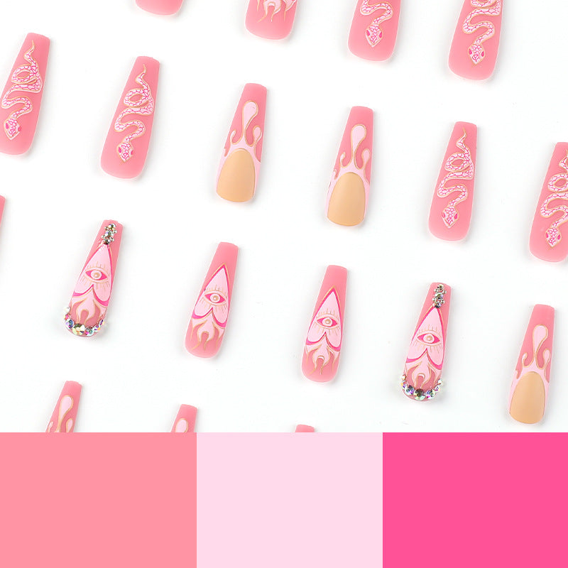 Kunstvolle Nagelverlängerungen mit schlangen- und blumenverzierung Brehn