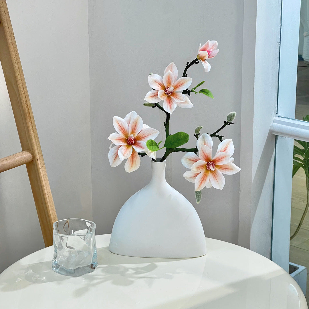 Dekorative künstliche Blumenarrangement