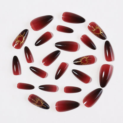 Kunstnagelset mit glamourösem Herz- und Sonnenmotiv Brehn