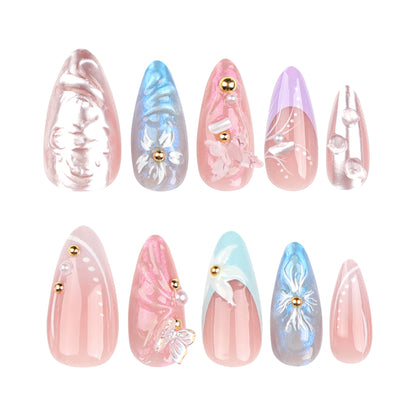 Kunstvolle Stiletto-Nägel mit zarten Blumen- und Glitzerverzierungen Brehn