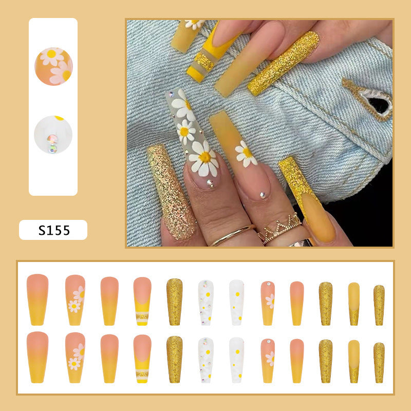 Kunstnagelset mit bunten Sonnenblumenmotiven und glitzernden Akzenten Brehn