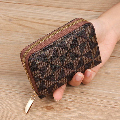 Geometrisch gemusterte Reißverschluss-Münztasche Brehn